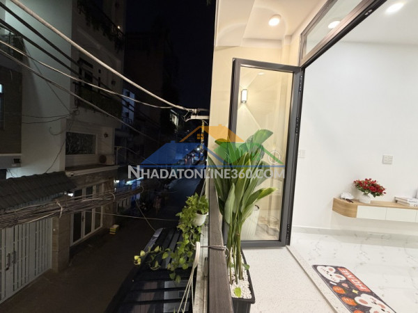 Bán nhà phú nhuận oto vào nhà 60m2 2 tầng nở hậu 5m đẹp kd đỉnh thích quảng đức 9.8 tỷ