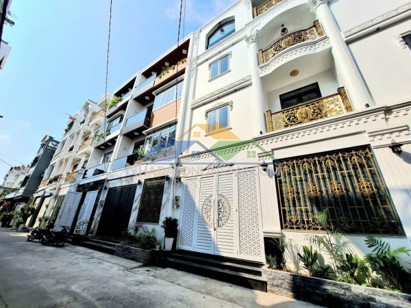 Nhà đẹp thang máy, ngang 10m, hẻm xe hơi huỳnh tấn phát, 8.5 tỷ