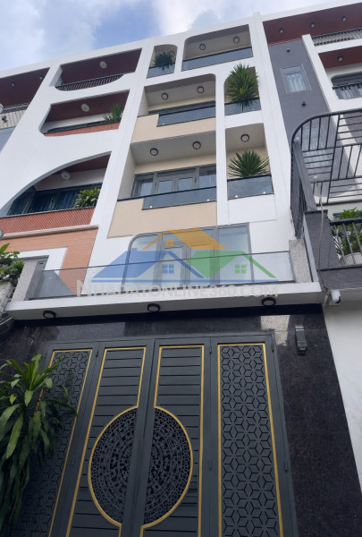 Bán nhà mới xây 5 tầng hẻm ô tô 7 chổ dt gần 60m2 giá 7,6 tỷ